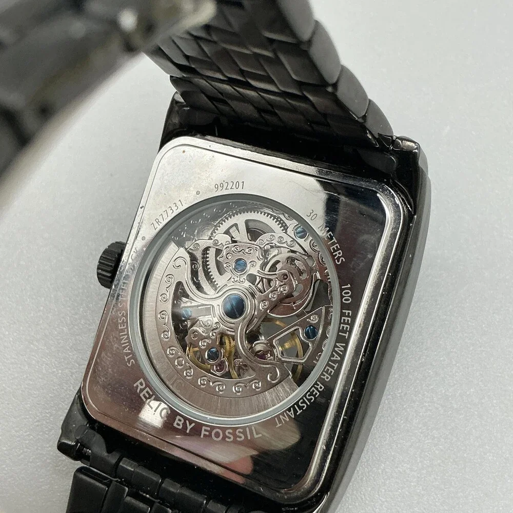 Relic by Fossil see photos